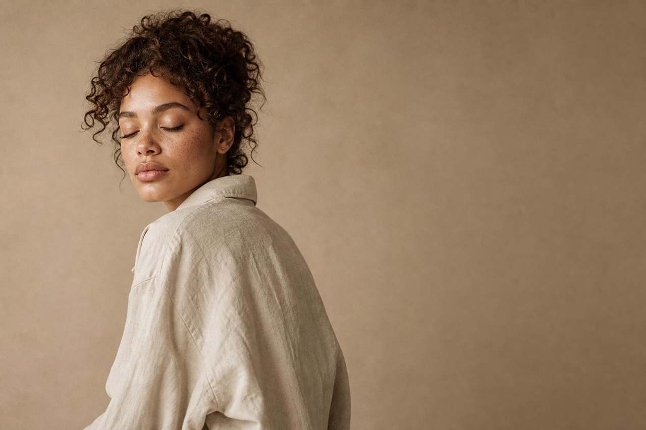 SACRAHAUS Spring campaign — editorial portrait of a model with healthy, glowing skin