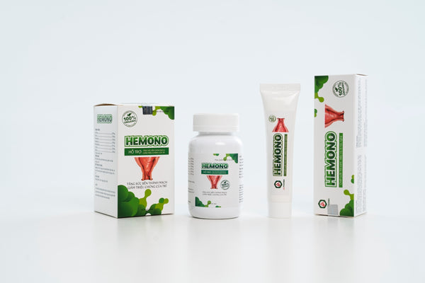 a white table topped with a bottle of liquid and a tube of toothpaste