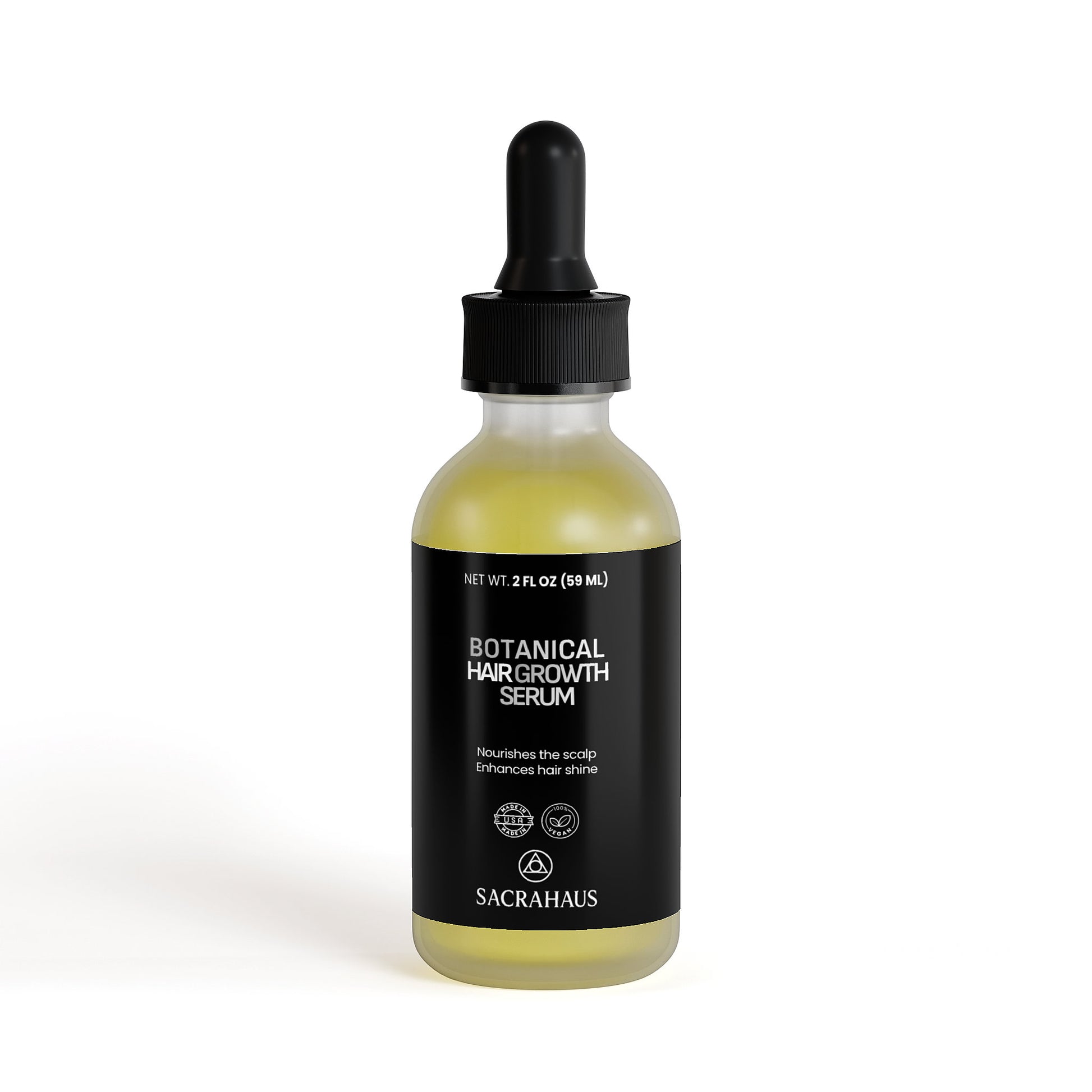 SACRAHAUS Botanical hair growth serum in a glass bottle with a dropper for nourishing hair and enhancing shine
