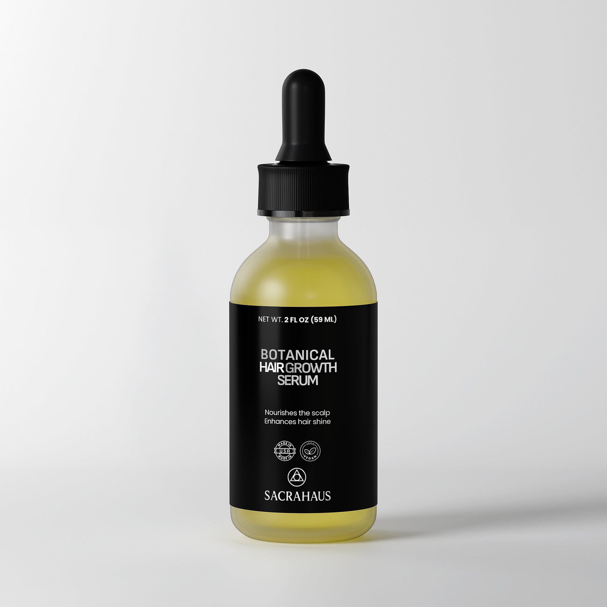 SACRAHAUS Botanical hair growth serum in a dropper bottle for nourishing the scalp and enhancing hair shine