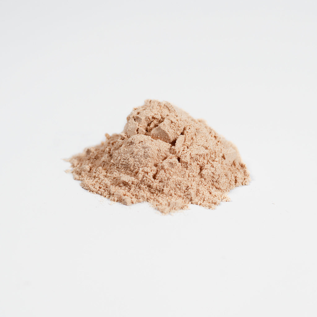 SACRAHAUS mushroom blend powder in light brown, perfect for smoothies and health recipes