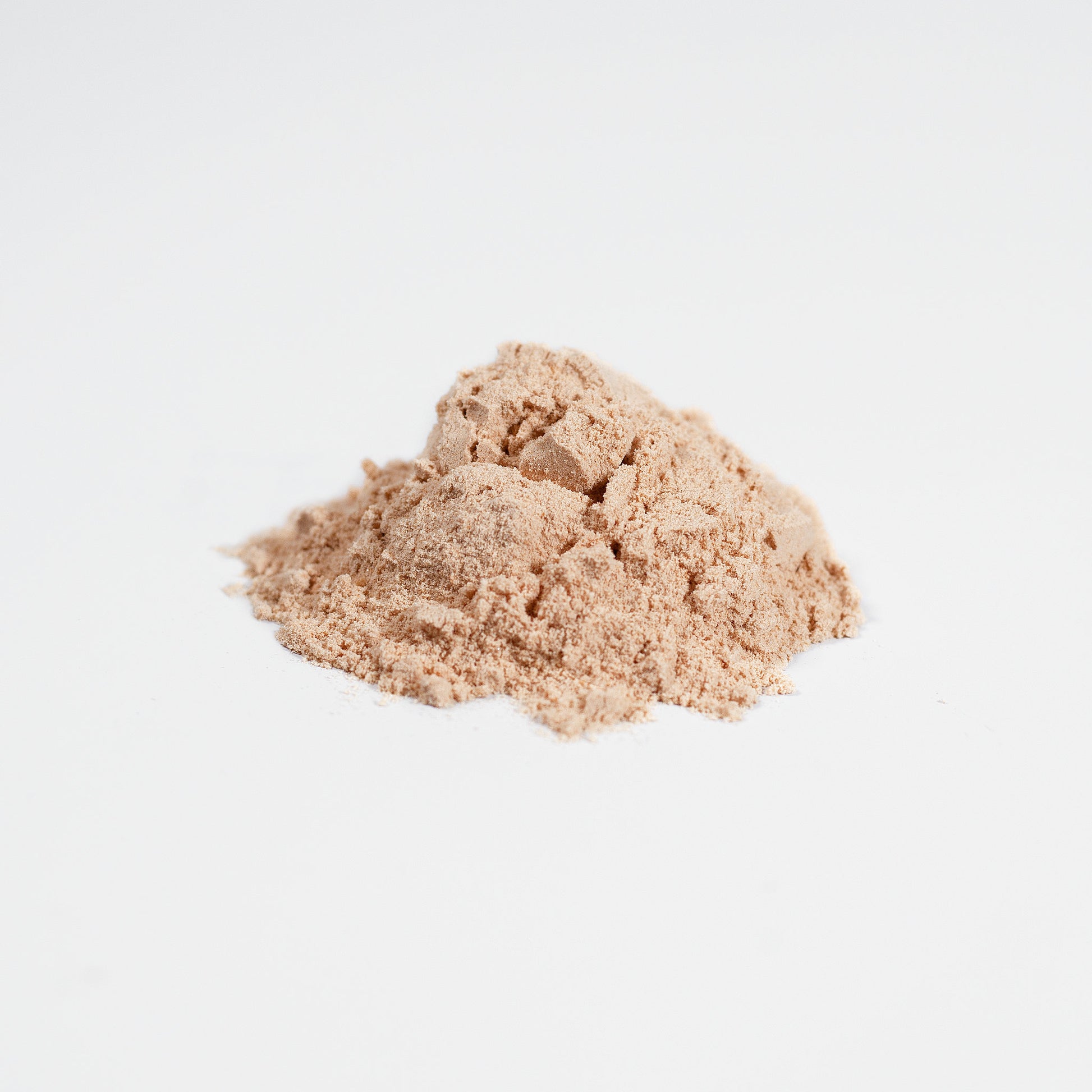SACRAHAUS organic vegan mushroom powder natural extract fine beige powder on white background