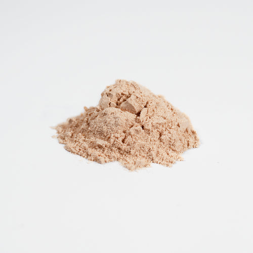 SACRAHAUS organic vegan mushroom powder natural extract fine beige powder on white background