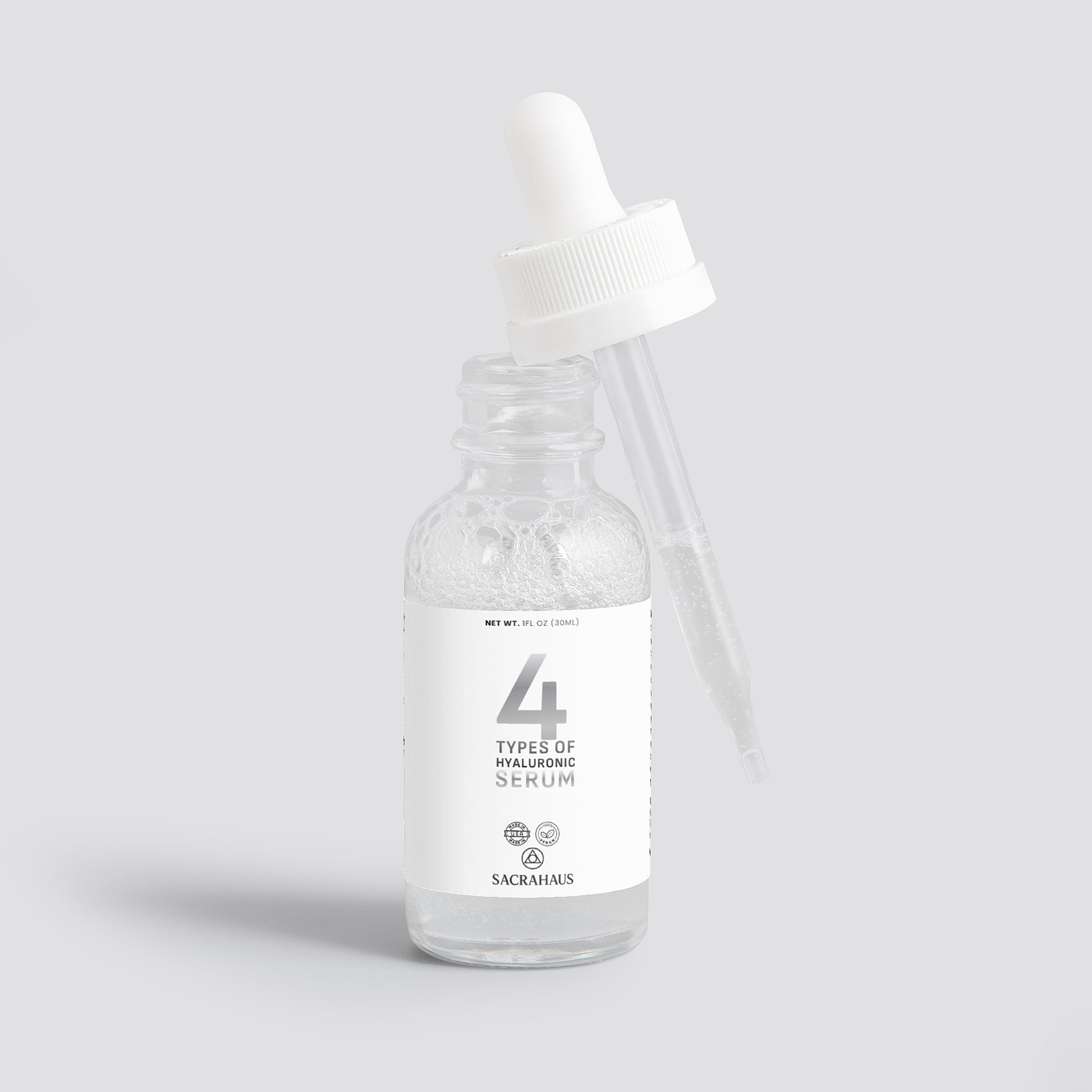SACRAHAUS vegan hyaluronic acid serum in dropper bottle for moisturizing and plumping skin