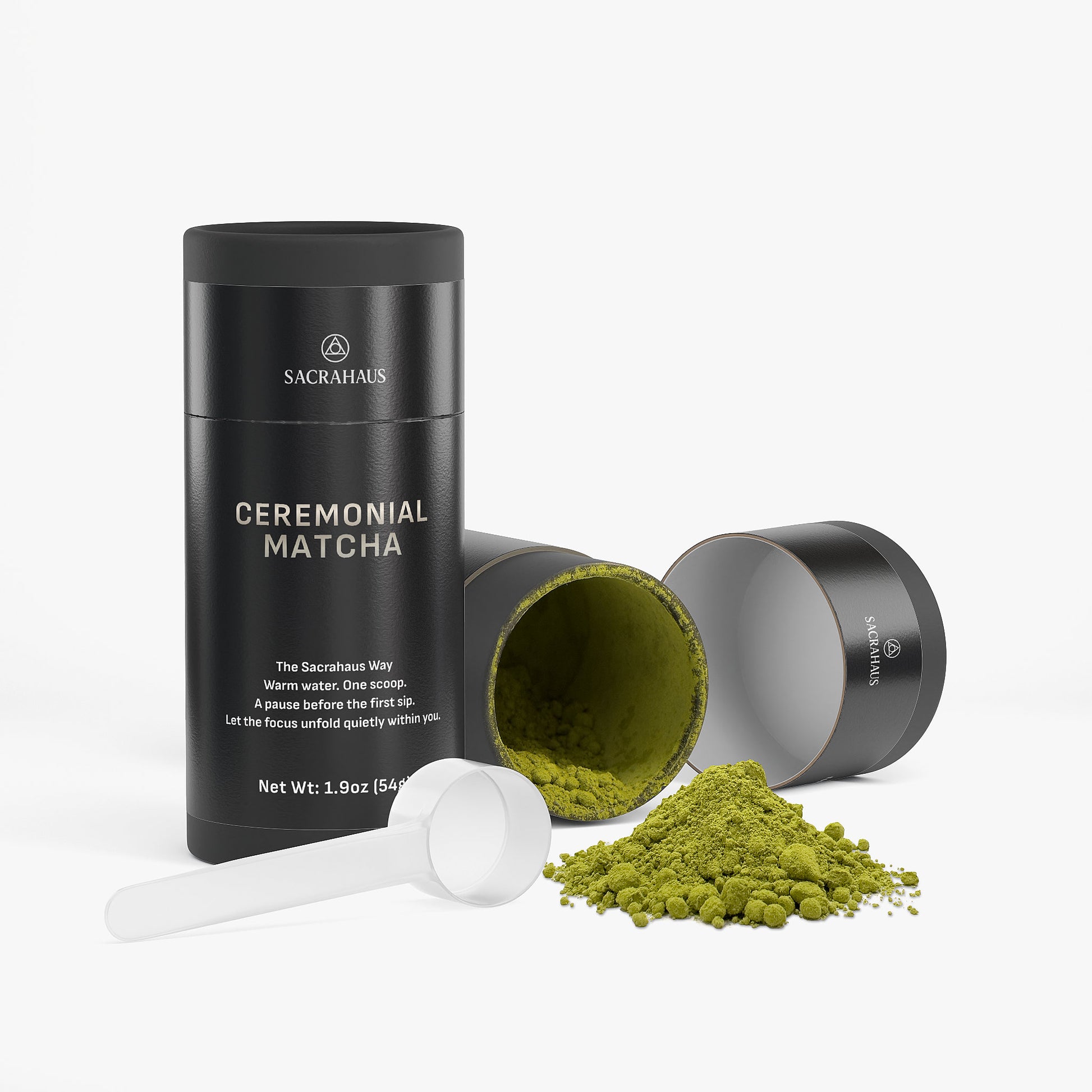 SACRAHAUS ceremonial matcha powder in black container with scoop and loose powder for premium green tea preparation