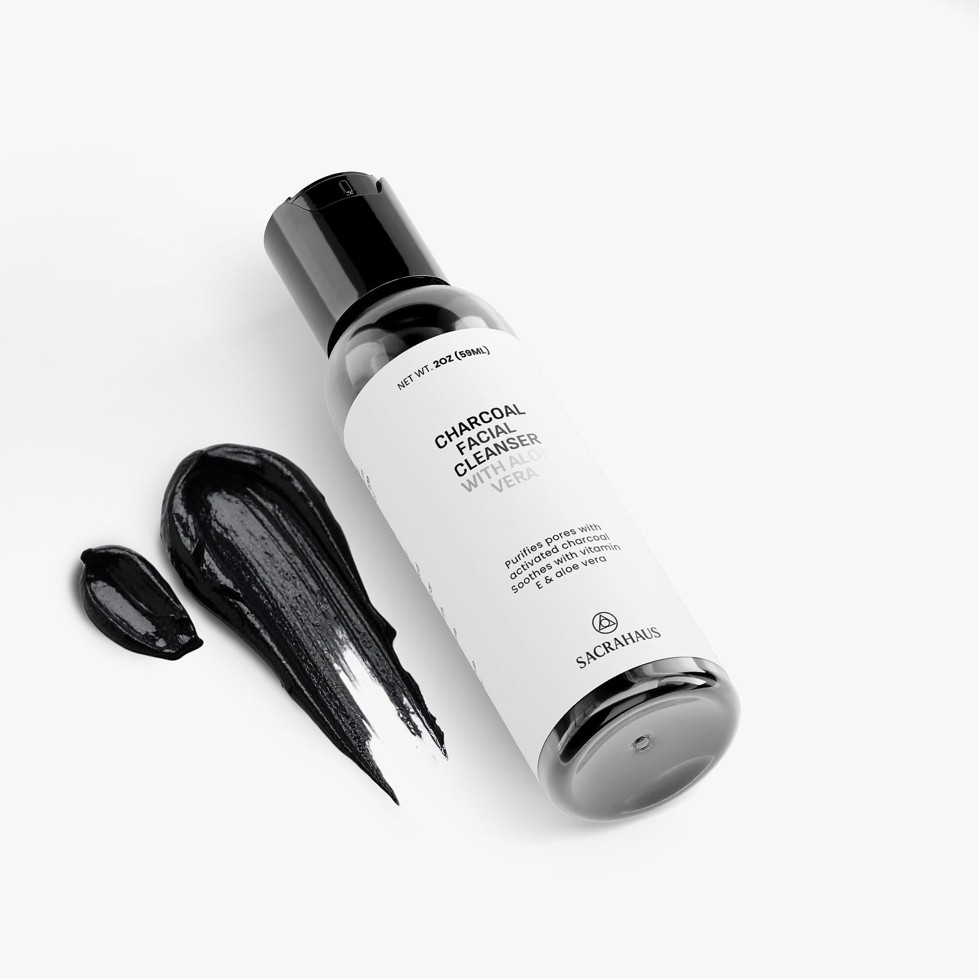 SACRAHAUS charcoal facial cleanser in black bottle with aloe vera for deep cleansing skin