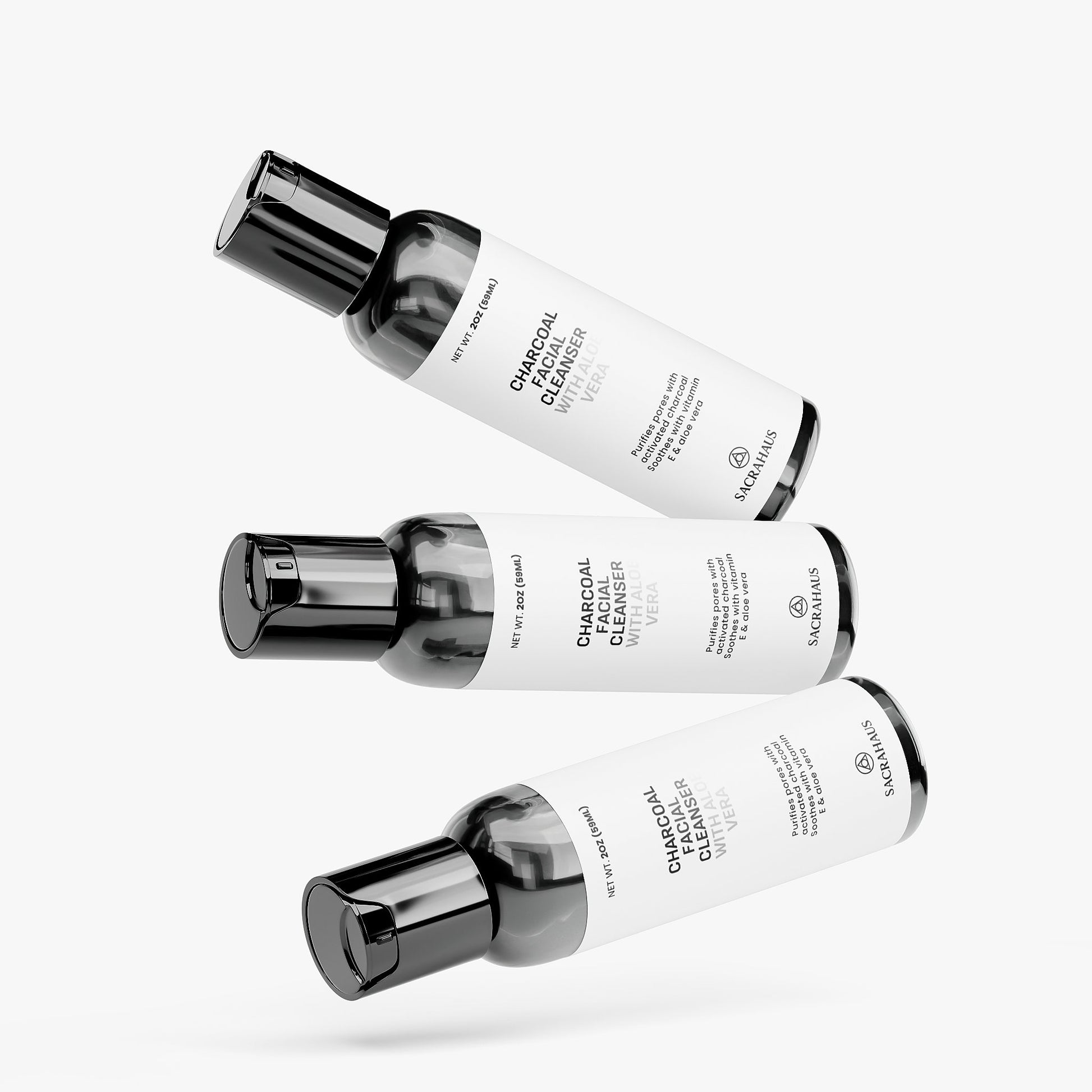 SACRAHAUS charcoal facial cleanser in three sleek bottles for effective skincare