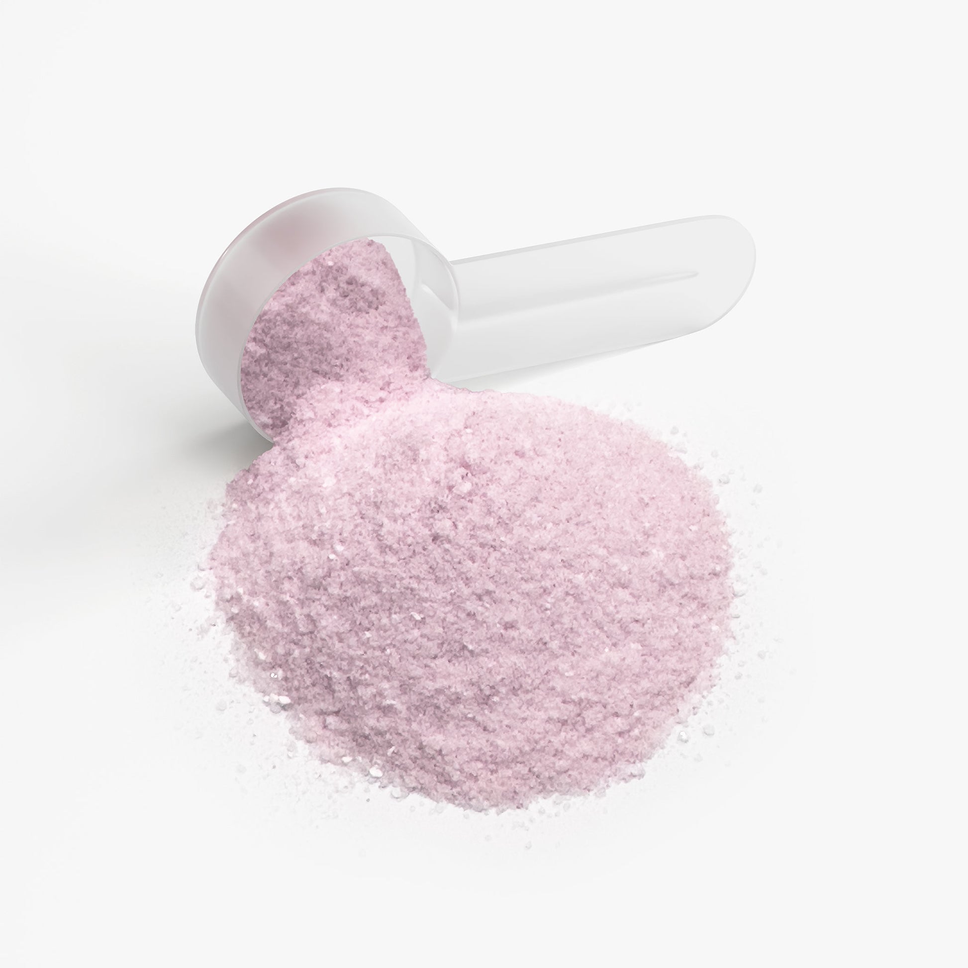 SACRAHAUS lychee hydration powder in a clear scoop showcasing its vibrant pink color