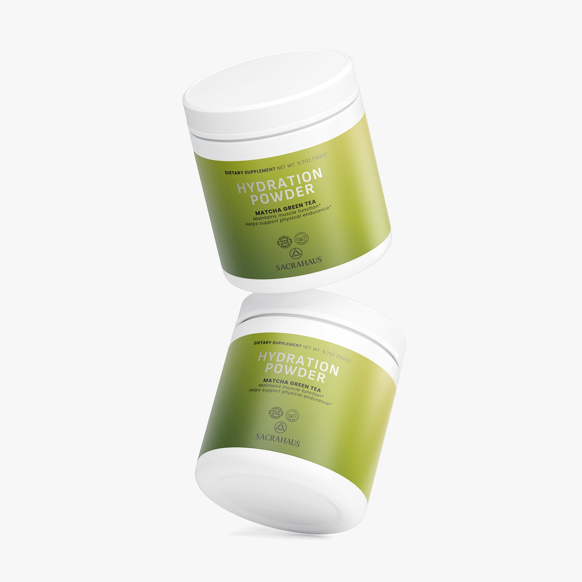 SACRAHAUS Matcha Hydration Powder containers stacked, featuring green tea for optimal hydration during workouts
