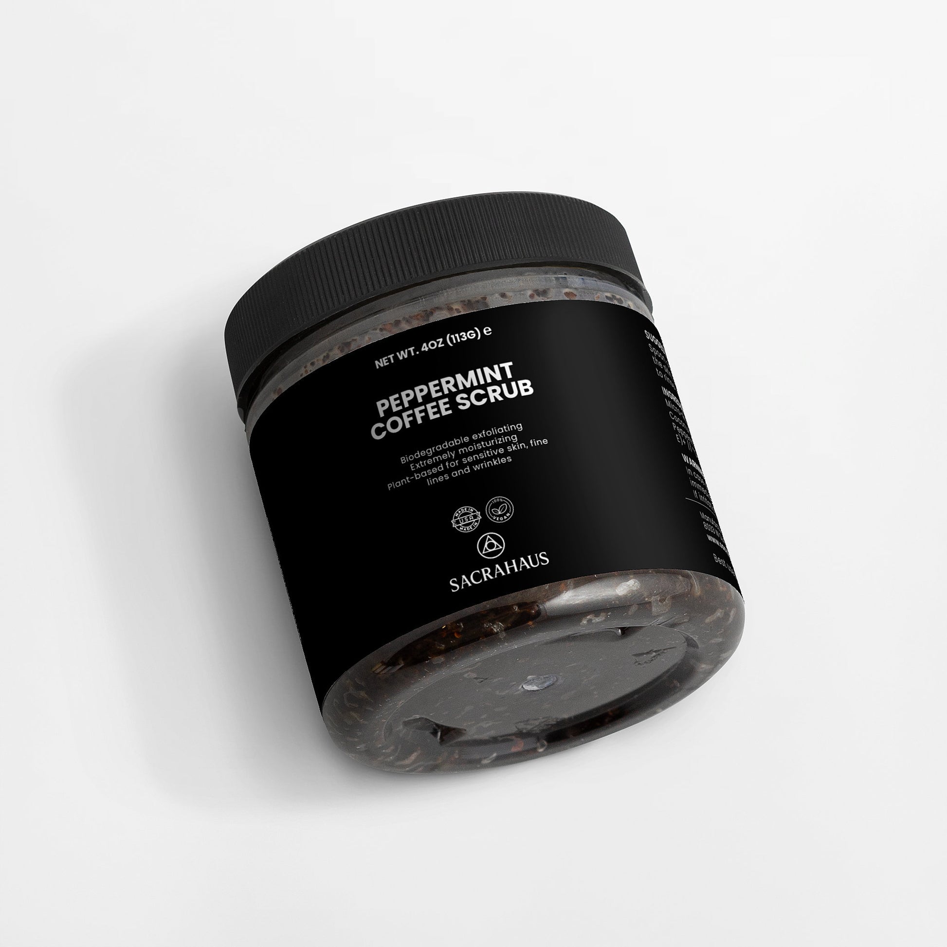 SACRAHAUS Peppermint Coffee Scrub for Sensitive Skin in a stylish black jar for gentle exfoliation