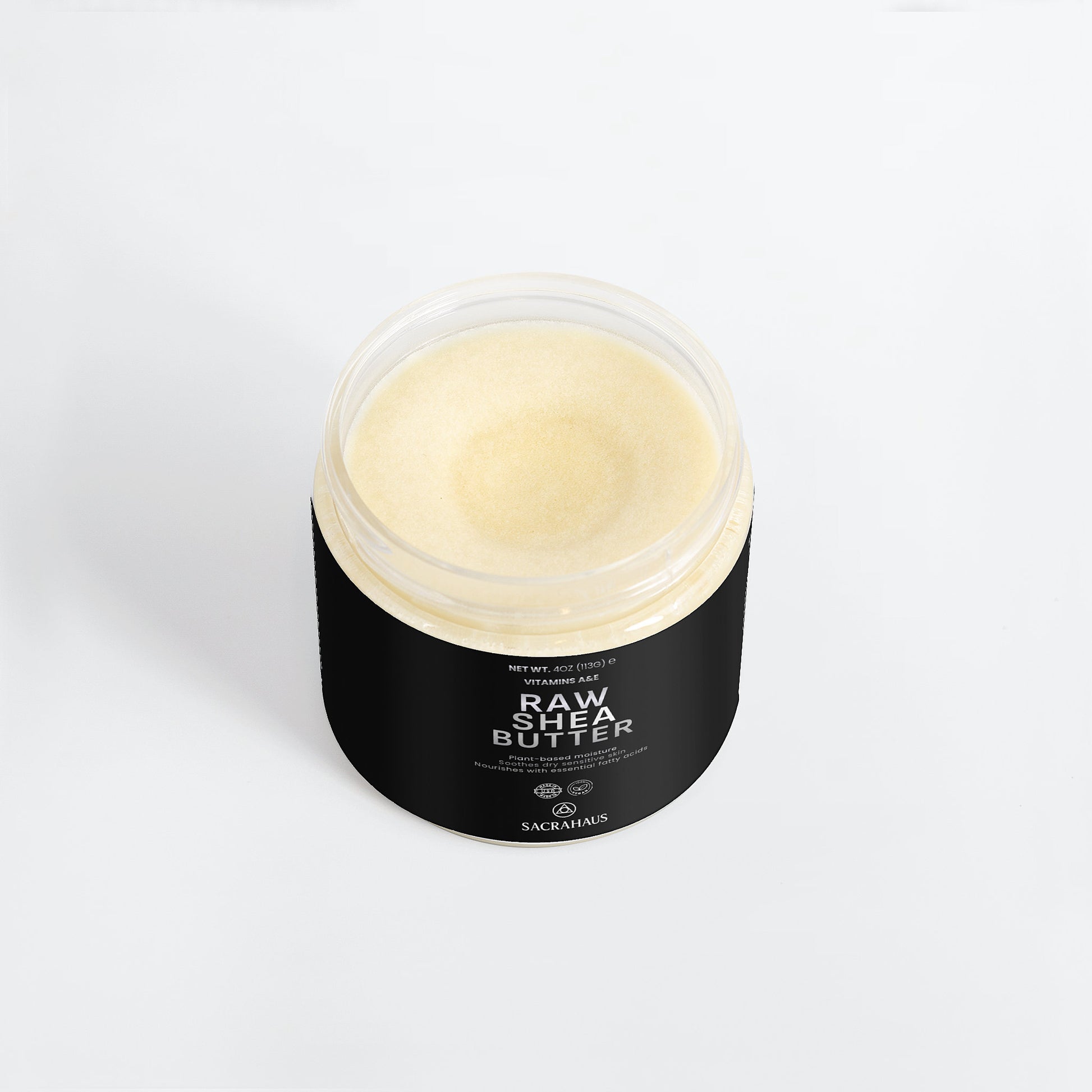 SACRAHAUS raw shea butter for skin in a clear jar with a black label, perfect for moisturizing