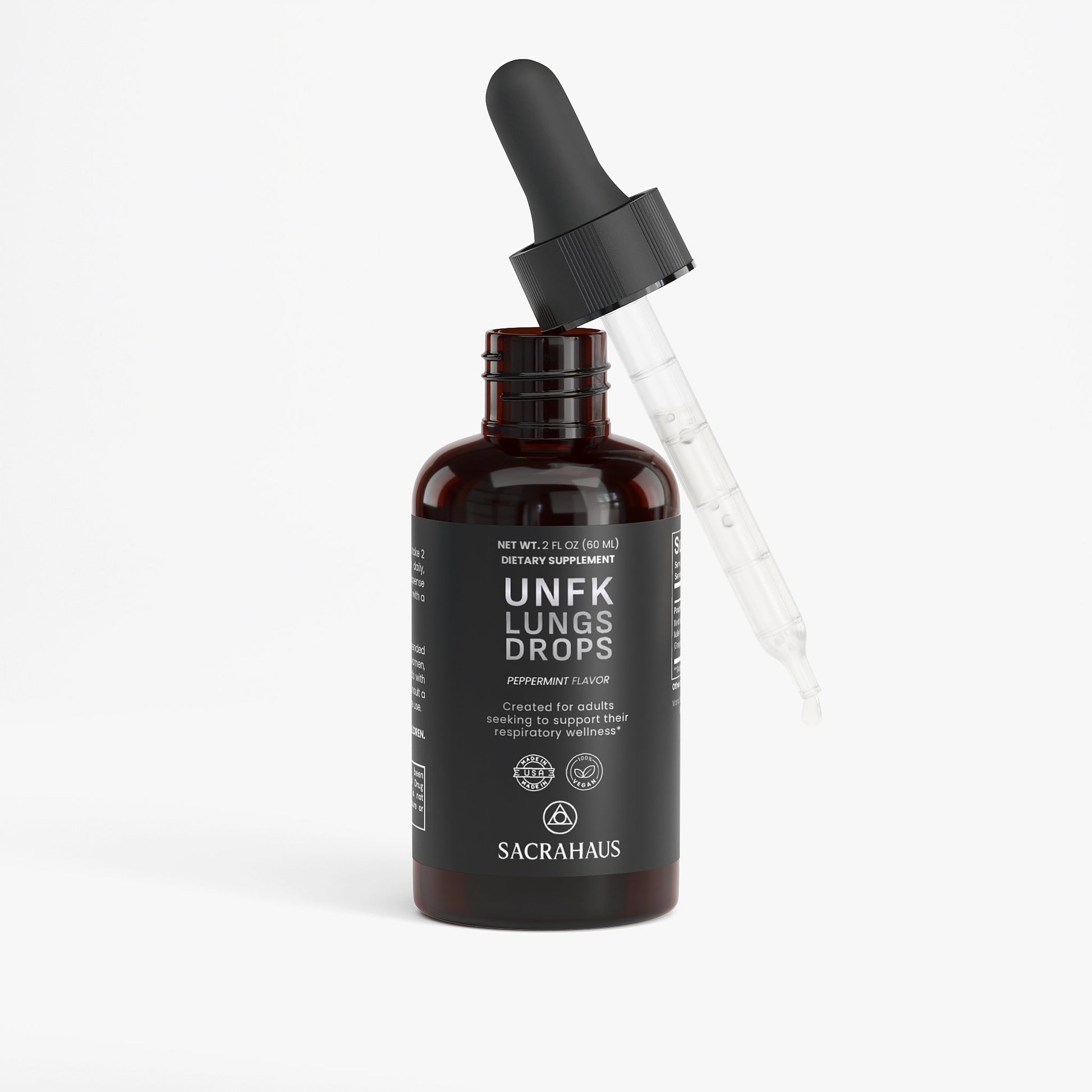 SACRAHAUS UNFK Lungs Drops in a dark bottle featuring a dropper, designed for respiratory health drops