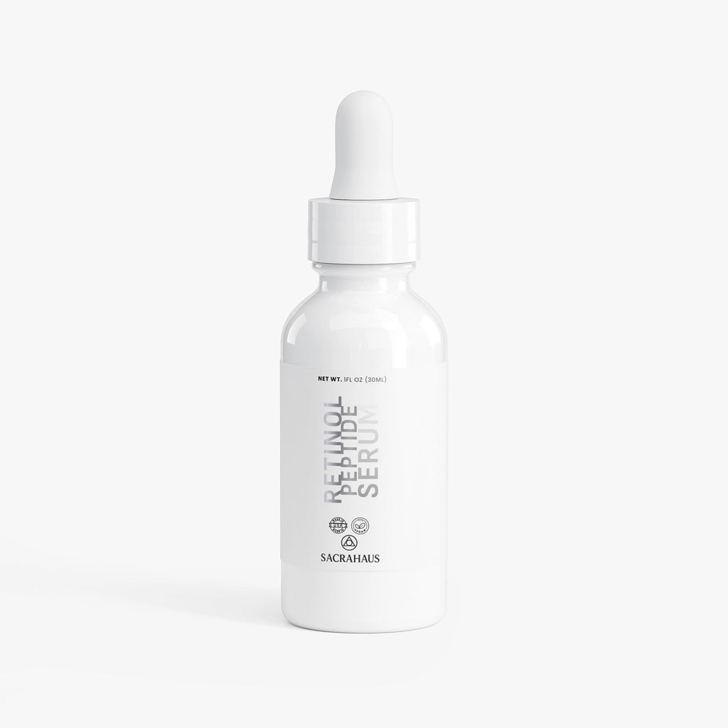 SACRAHAUS Retinol Peptide Face Serum in a sleek white bottle designed for radiance and skin revitalization