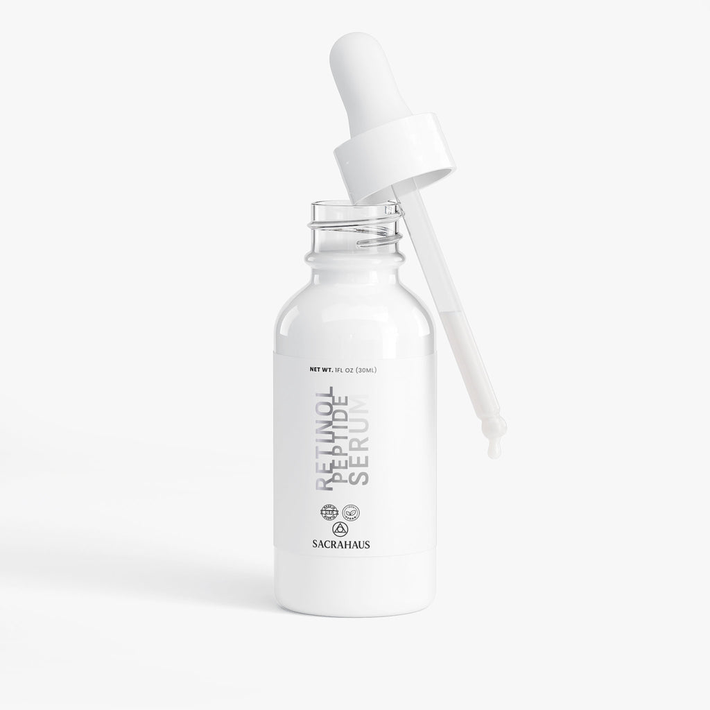 SACRAHAUS retinol peptide face serum in a sleek bottle with dropper for radiant skin