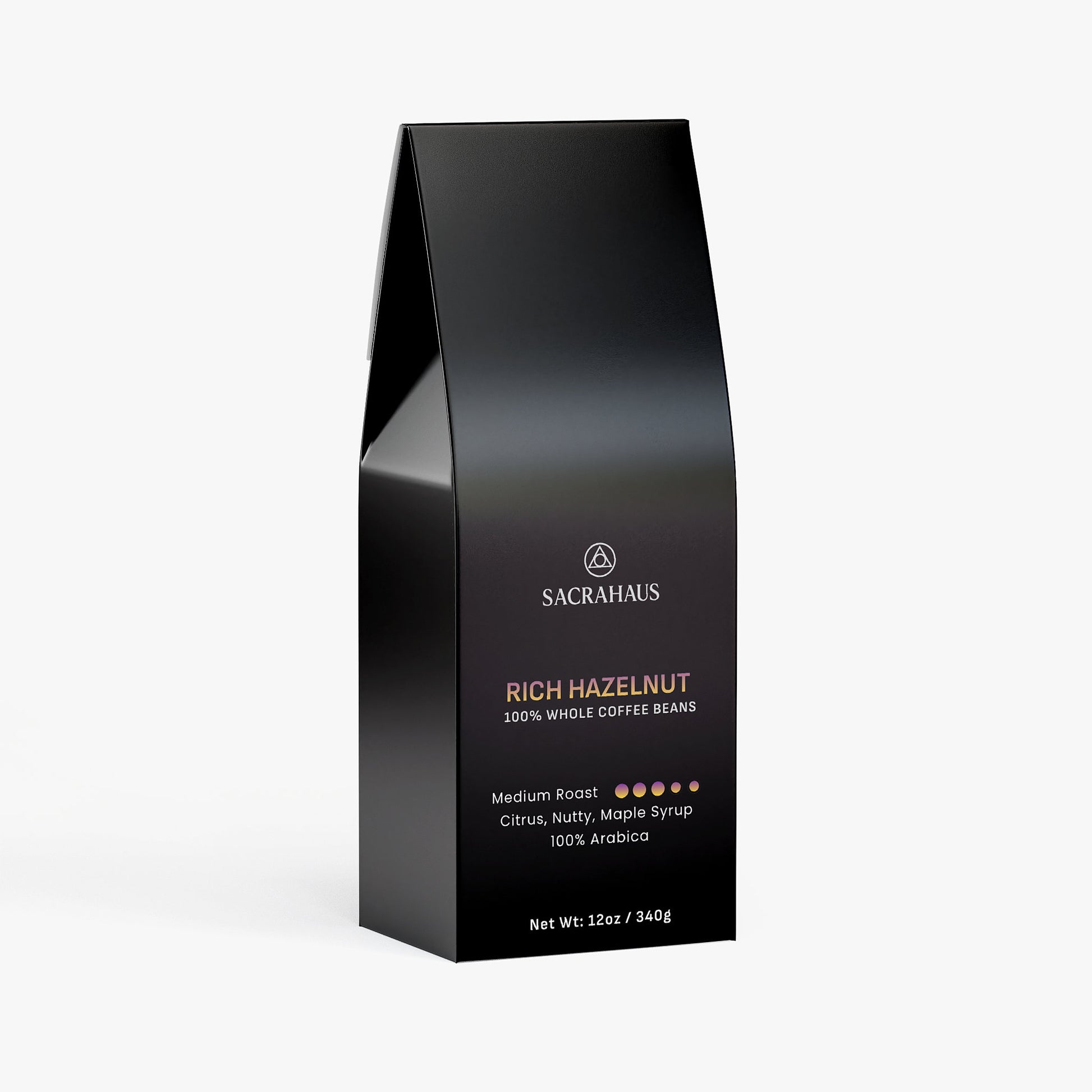 SACRAHAUS Rich Hazelnut Coffee Beans in a sleek black 12oz bag, featuring a medium roast and nutty aroma