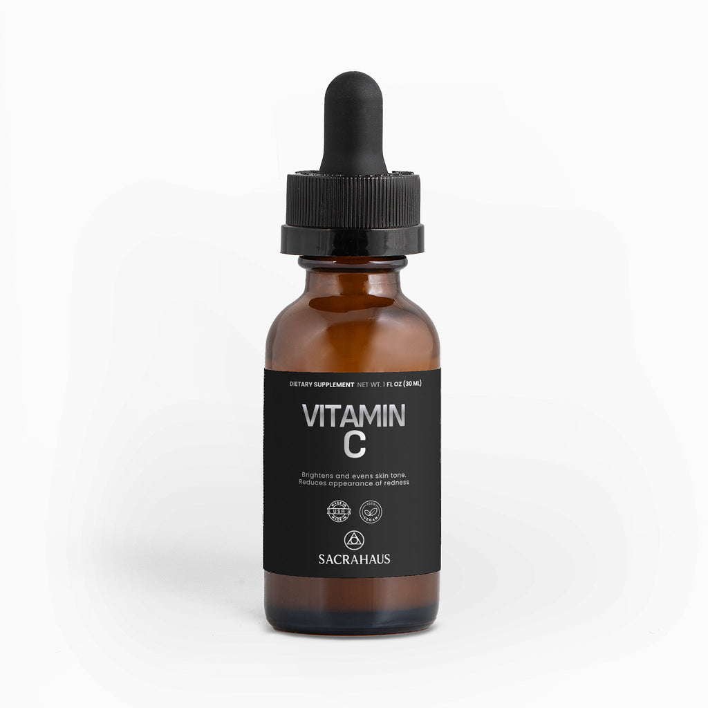 SACRAHAUS vegan vitamin C serum in a brown glass bottle with a dropper for brightening skin