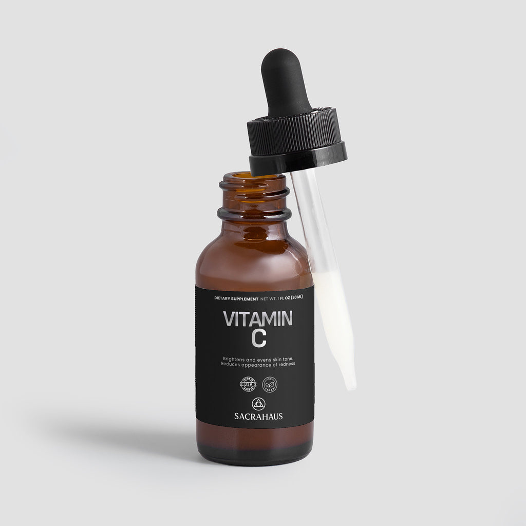SACRAHAUS vegan vitamin C serum in a brown bottle with a dropper for brightening skin