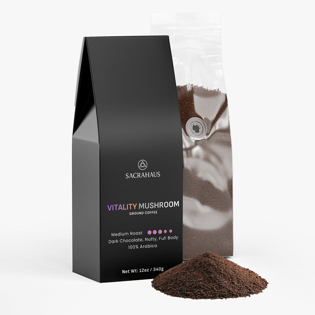SACRAHAUS vitality mushroom coffee in a sleek black bag with ground coffee pile