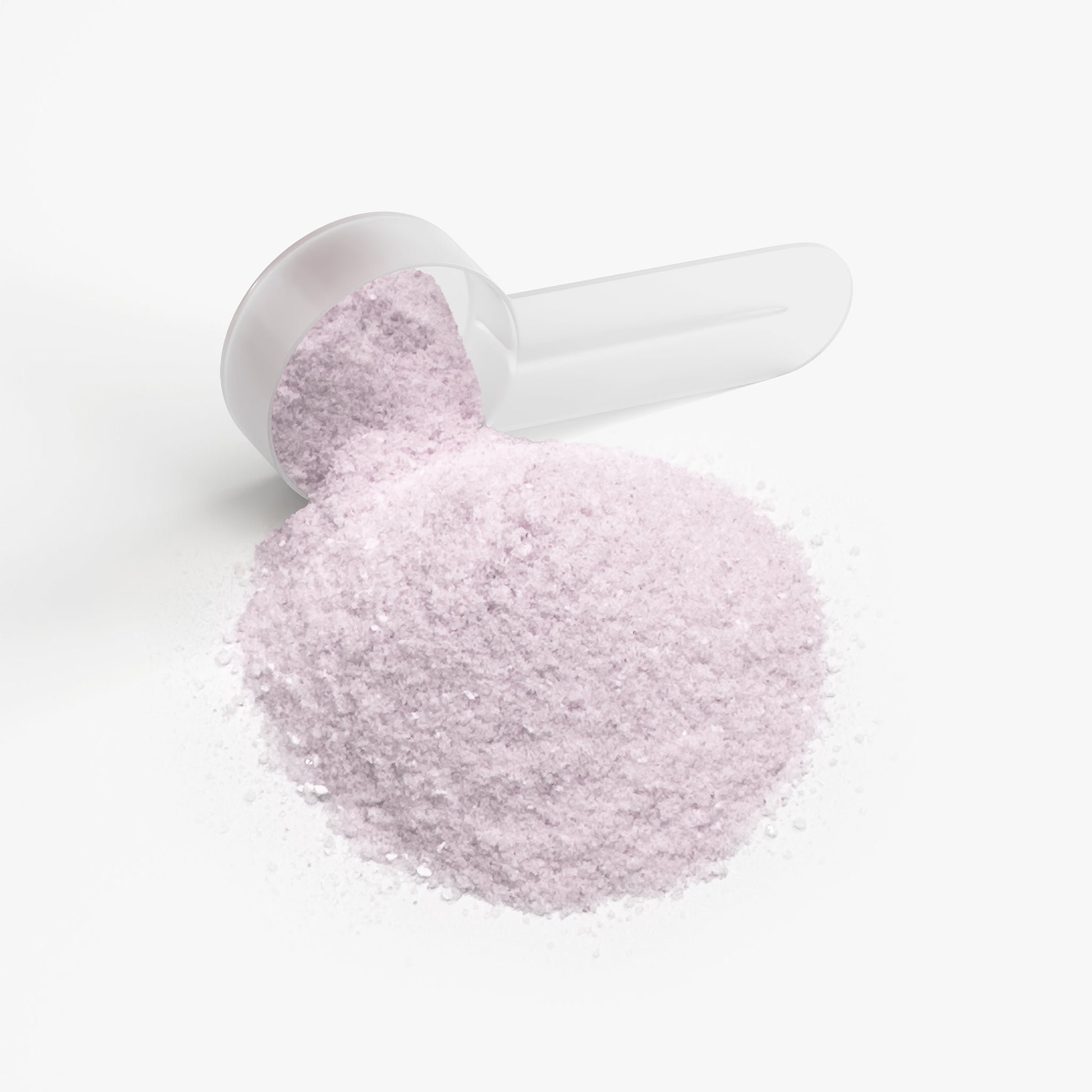 SACRAHAUS yuzu energy powder in a scoop, featuring a fine pink texture for pre-workout energy boost