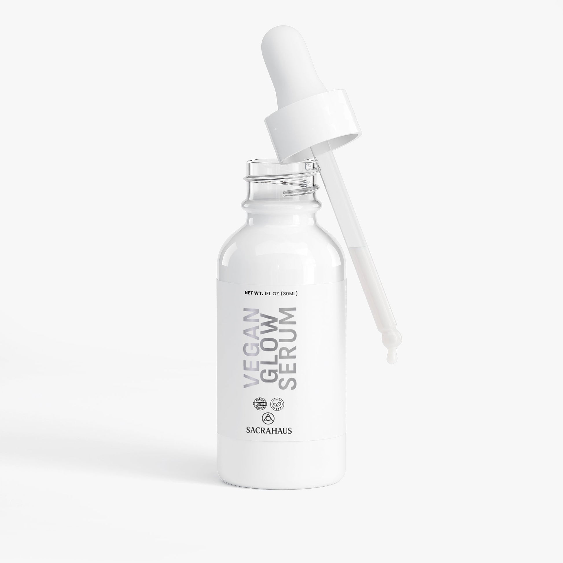 SACRAHAUS vegan glow serum in a dropper bottle for radiant and healthy skin