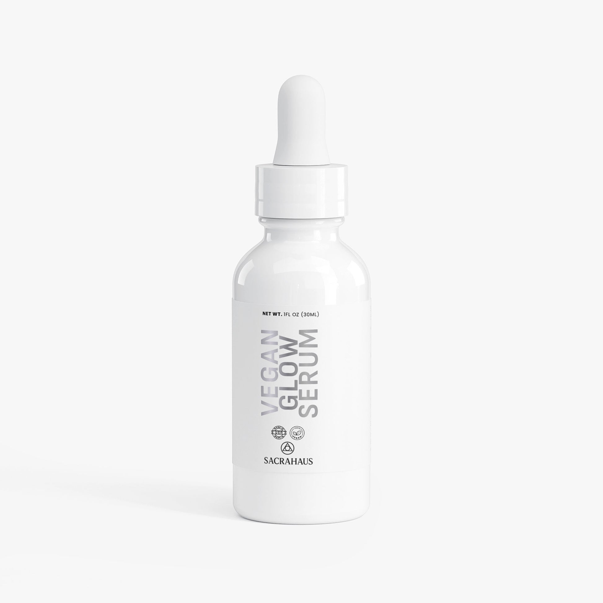 SACRAHAUS vegan glow serum in a white dropper bottle for radiant and healthy skin