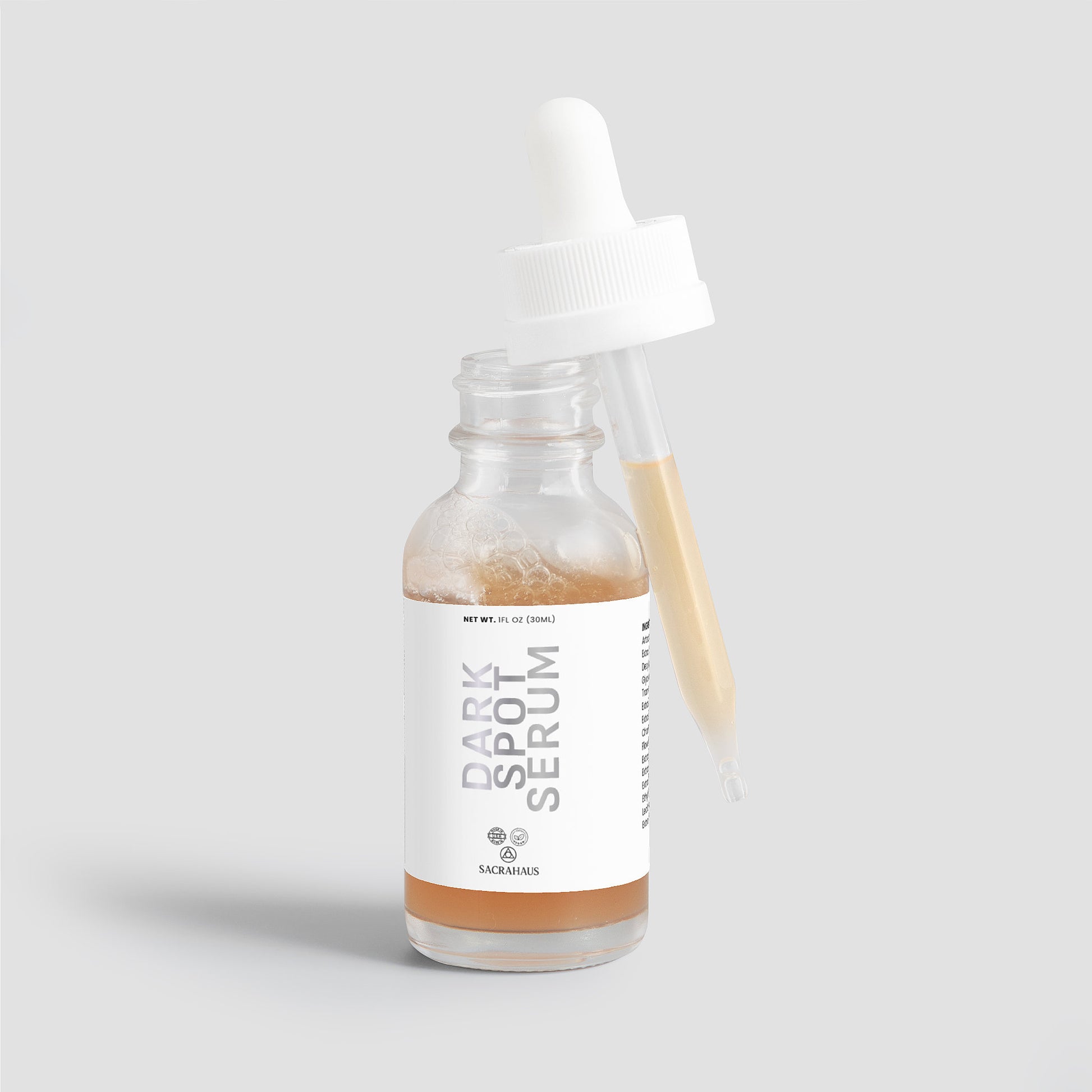 SACRAHAUS Dark Spot Serum for Sensitive Skin in a glass dropper bottle with pipette